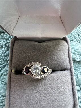 Silver Ring with Clear Center and Blue Accent Stones